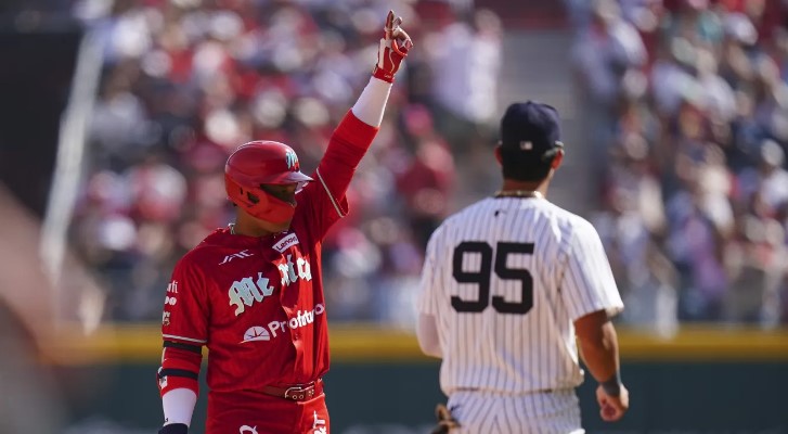 “Aaron Boone alaba el ‘show’ de Robinson Canó en el juego de los Yankees contra los Diablos Rojos, y este responde”