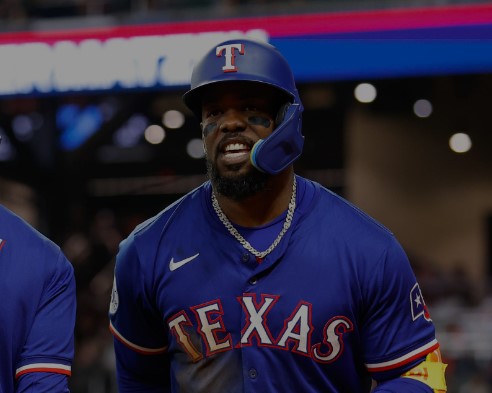 Adolis dio uno de los 3 HR que ayudaron a Rangers a frenar escobas de Bravos